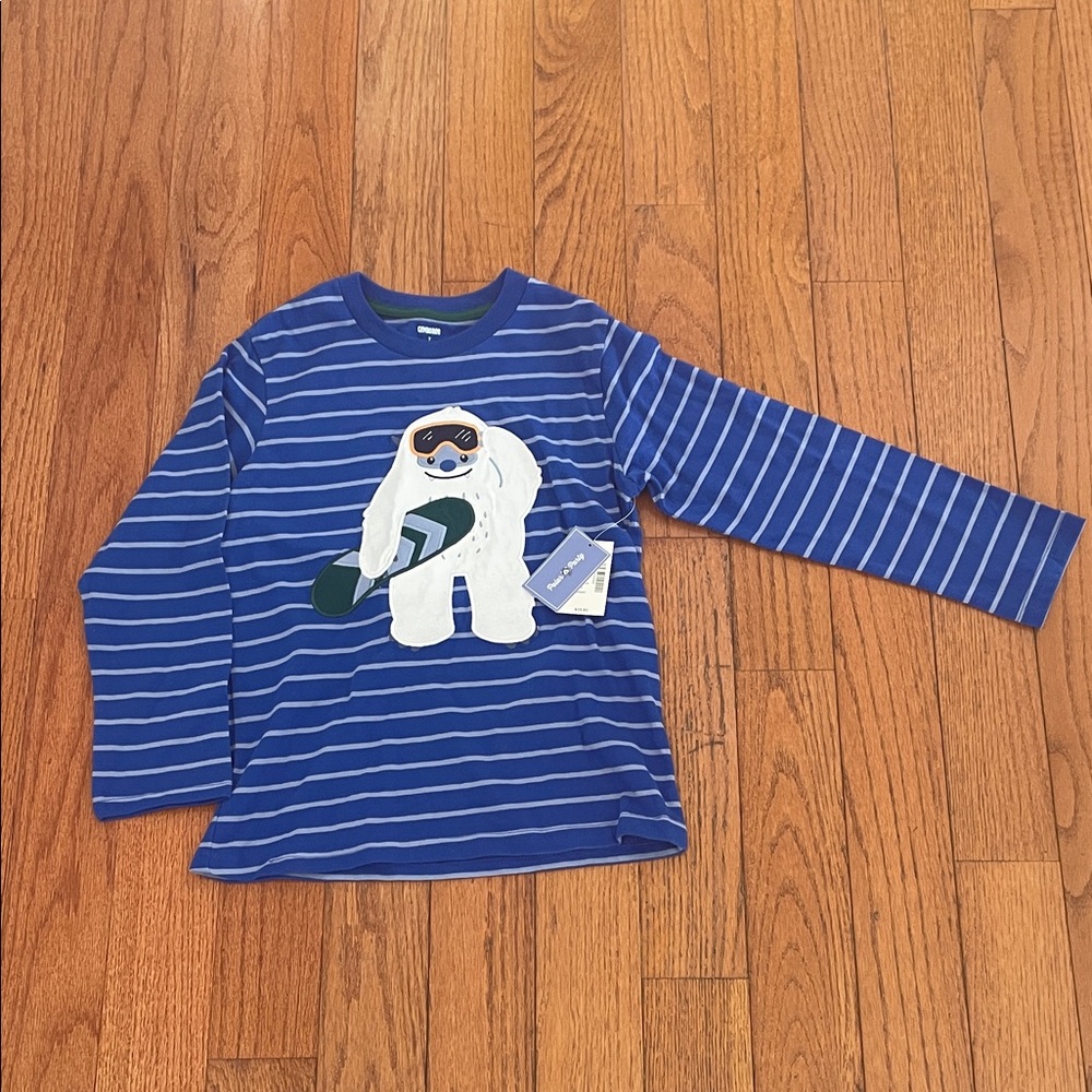 Brand new Blue Striped Long Sleeve Shirt with Sloth Design. Size seven.